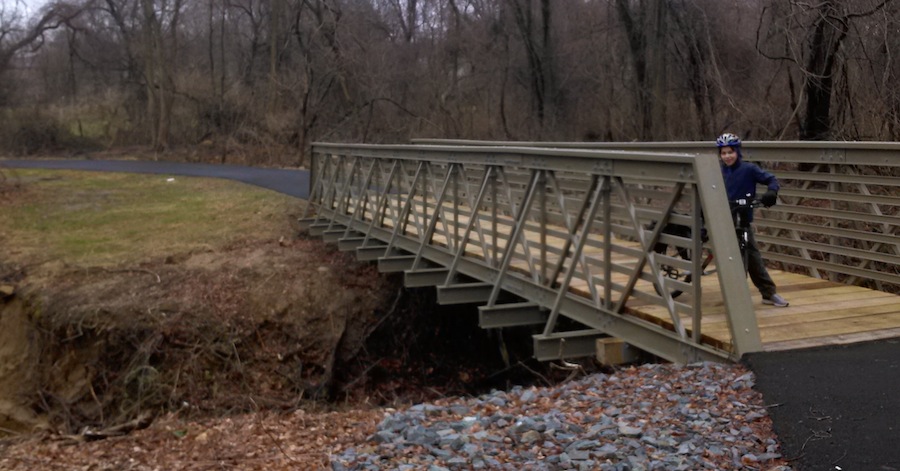 This little bridge recently connected the Jefferson Farms neighborhood in New Castle to the Wilmington-New Castle Greenway. Before this bridge, people living right next to the greenway - just yards away - had to drive miles to get to it.
